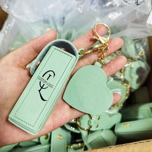 Bolsa de Piel Sintética de Alta Calidad para Brillo Labial con Llavero, Mini Bolsa de PU para Lápiz Labial y Brillo Labial con Logotipo Personalizado - Product Image 1