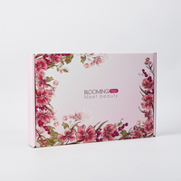 Boîte cadeau rose avec impression de logo personnalisé Boîte d'expédition postale en carton ondulé avec impression de colis postal