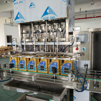 Machine à piston quantitative entièrement automatique de haute précision de 200 ml, contrôlée par PLC, pour l'huile moteur, l'huile lubrifiante et le miel en bouteilles en verre