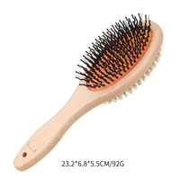 Peigne à poils pour animaux de compagnie portable multi-usage avec manche ergonomique en bois et métal, démêlant les poils flottants, favorisant la santé du pelage des chiens et des chats
