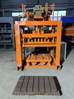 Machine de fabrication de briques de pavage creuses solides manuelles QT4-40