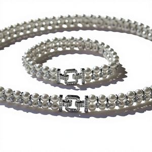 สร้อยข้อมือมุกแบบวินเทจประดับเพชรสองแถวพร้อมหัวเข็มขัดแบบถัก สามารถเย็บติดกับเสื้อผ้าได้ สร้อยคอเสื้อสเวตเตอร์ ดีไซน์เรียบหรู ใช้ได้ทั้งผู้หญิงและผู้ชาย - Product Image 1