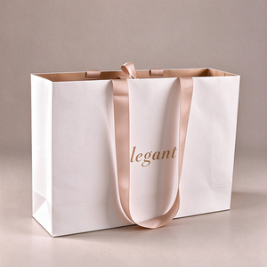 Luxury Custom Logo Eco-Friendly Coated <b>Paper</b> Clothing <b>Bag</b> with Ribbon Handle - Printed Shopping Packaging for Clothing <b>Store</b> - Product Image 1