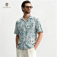 Chemise de vacances légère et respirante pour homme, 100 % coton, motif floral abstrait bleu ardoise, style cubain, 120 g/m², idéale pour les resorts (ODM)