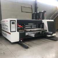 Machine industrielle haute vitesse de découpe, rainurage et impression flexographique pour la fabrication de boîtes en carton ondulé