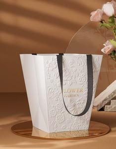 <strong>Trapezoid</strong> Customized Luxury Printed Design 3D Flower <strong>Bag</strong> Embossing Paper Gift <strong>Bag</strong> with Gold Stamping Foil Logo - Product Image 3