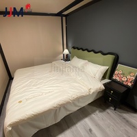 Maison préfabriquée extensible en conteneur JJM avec terrasse latérale, 3 chambres, salle de bain et cuisine, pour habitation ou hôtel