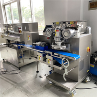 Machine de remplissage et de farce entièrement automatique d'équipement de cuisson intelligent et stable Machine à gâteau de lune à haute capacité économique