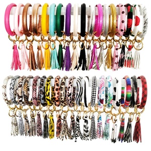 Commercio all'ingrosso di cuoio dell'unità di elaborazione nappa cerchio portachiavi donne braccialetto portachiavi <span class=keywords><strong>ragazza</strong></span> portachiavi cinturino da polso <span class=keywords><strong>regali</strong></span> di <span class=keywords><strong>natale</strong></span> - Product Image 1