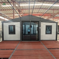 Maison conteneur extensible avec design de toit en pignon, option d'ajouter une grande terrasse et un revêtement de sol en verre-magnésium ignifuge