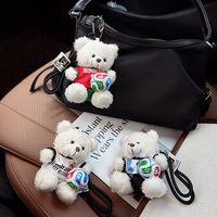Porte-clés en peluche ours en peluche maillot d'équipe de football, pendentif mini ballon et sac, pour fans de stars de football, vente en gros