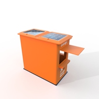 Kiosque de vente solaire modulaire pour le marché africain Système de point de vente Réfrigérateur Station de charge Cabine en fibre de verre Propriétaires de magasins Orange FLOWVISUAL