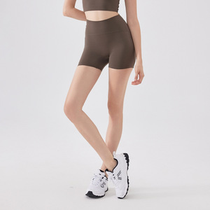 Shorts de sport unis pour femmes, extensibles dans 4 directions, effet peau de pêche, taille haute, pour la course et le Pilates - Product Image 1