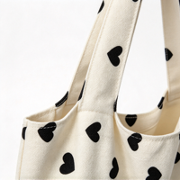 Sac fourre-tout en toile blanche avec imprimé cœur noir, sac à main décontracté à porter à l'épaule pour femmes, pour le shopping, les voyages et l'usage quotidien