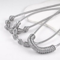 Collier élastique à maillons en acier inoxydable, motif géométrique à rayures métalliques Cyberpunk, tendance, rétractable, ligne creuse