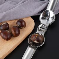 Gadget de cuisine Broyeur de châtaignes manuel en plastique Broyeur de châtaignes à poignée confortable