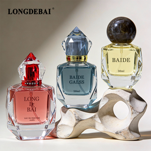 Irregularly Designed Transparent Glass 30ml, 50ml, 100ml Luxury <b>Perfume</b> Empty Spray <b>Bottles</b> and <b>Red</b> Plastic Cap - Product Image 2