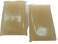 Colle thermofusible industrielle jaune, colle thermofusible en gelée, colle thermofusible animale pour machine à coller le papier