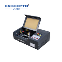 Machine de gravure laser CO2 de table électrique 3020 40W refroidie par eau haute précision AI/DXF/DST pour bois/papier/PVC/cristal/roche