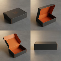 Boîte d'abonnement en carton ondulé écologique noir graphite mat avec intérieur orange vif, sans ruban adhésif, auto-scellante pour e-commerce DTC
