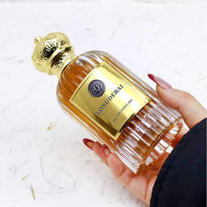 Botella de Perfume de Vidrio Vacía Irregular Única con Pulverizador de Bomba, 100ml, Tapa Dorada con Corona, Serigrafiada, Ecológica y Reciclable - Product Image 6