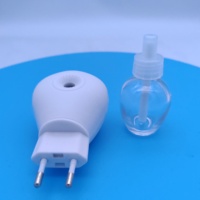 Diffuseur électrique mural pour parfum d'ambiance avec indicateur lumineux et bouteille en verre pour huiles parfumées