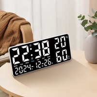 Nouvelle horloge murale de salon de température et d'humidité Horloge électronique simple et multifonctionnelle avec grande police et veilleuse