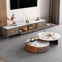 Ensemble de meubles TV en marbre avec étagère vitrée, portes coulissantes à lumière chaude, tiroirs de rangement et tables basses gigognes pour la maison