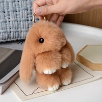 Pendentif Lapin en Peluche Doux et Mignon de 15 cm avec Pompon en Fausse Fourrure pour Voiture, Sac ou Porte-clés