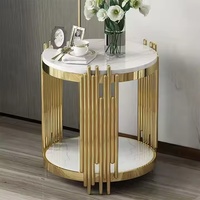 Table basse moderne de luxe en fibre de verre dorée avec base en acier inoxydable Meubles de salon Table d'appoint pour hôtels et villas