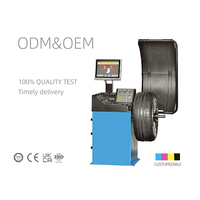 Équilibreur de roue de pneu d'atelier automobile certifié CE 0.2kw équipement essentiel pour l'alignement de roue de service de voiture
