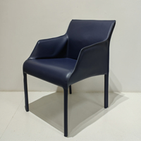 Chaise avec accoudoirs en métal orange pour salle à manger en cuir