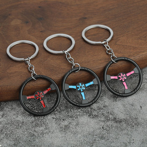 Llavero de aleación de zinc con diseño de volante de carreras, moderno, de fábrica, pequeño regalo creativo para parejas, colgante para bolso - Product Image 1