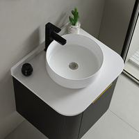 Meuble-lavabo mural moderne et minimaliste noir cannelé, écologique, avec vasque à poser circulaire et éclairage LED pour salle de bain et chambre