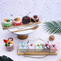 Boîte d'emballage de rouleau à gâteau portable transparent en plastique personnalisé Boîte de cuisson de rouleau suisse de mousse de jaune d'oeuf pour dessert