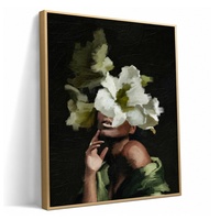 Art floral de femme noire encadré en alliage doré mat raffiné pour projets de décoration intérieure d'hôtels de charme et de maisons d'hôtes