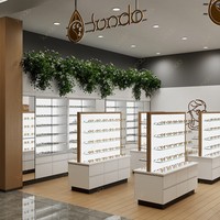 Vitrine d'exposition optique moderne Sundo avec éclairage arrière, comptoir îlot pour lunettes, fabricant d'agencements pour magasins d'opticiens