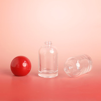 Flacon d'émulsion en verre à fond épais personnalisable de 30 ml, bouchon estampé à chaud, pulvérisateur à pompe, couleur personnalisée, forme elliptique, modèle JG-94 JIN