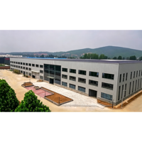 Entrepôt préfabriqué en acier moderne, durable et résistant au vent, pour le stationnement des tracteurs, le stockage du foin et les équipements miniers