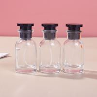 Bouteilles de parfum de luxe personnalisées OEM/ODM en gros, logo personnalisé, bouteilles de parfum vides transparentes professionnelles 25ml