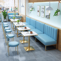 Meubles de restaurant d'art en fer de luxe léger usine de Foshan café commercial canapé contreplaqué ensemble table et chaises en marbre