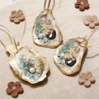 Ensemble de 3 ornements en coquille d'huître avec étoiles de mer et perles, faits à la main avec des coquillages naturels et une corde dorée