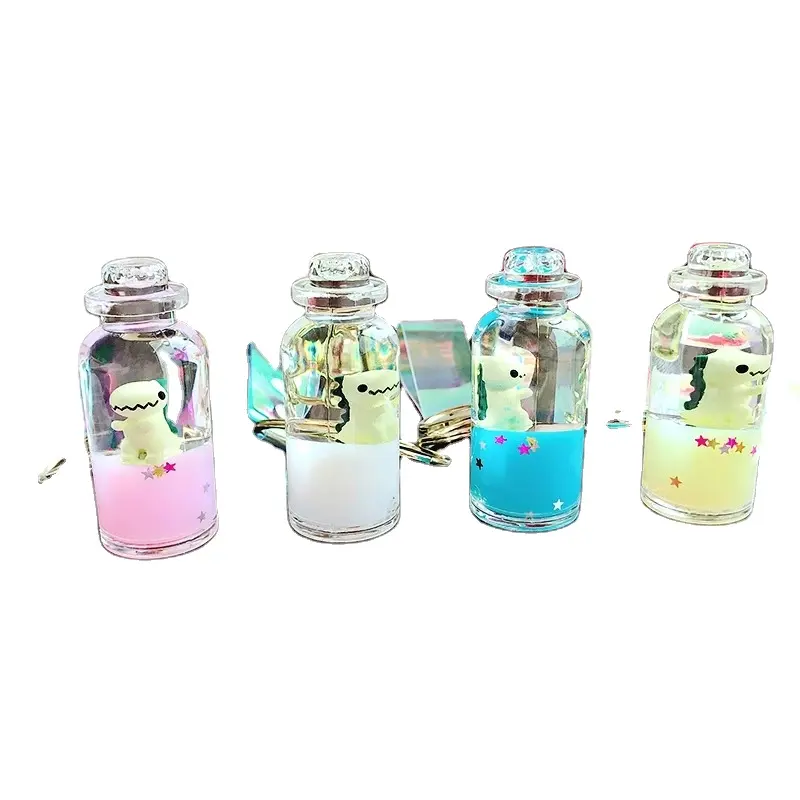 Xinxing 2021 Fashionable Cute Dinosaur Acrylic Milk Bottle Mobile Liquid Quicksand Drifting Bottle Cute Keychain