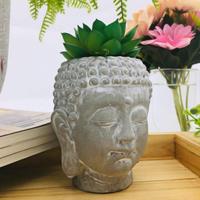 Vente en gros de pots à fleurs en forme de tête de Bouddha sereine, pot en ciment en forme de tête de Bouddha pour la décoration intérieure et extérieure