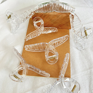 Grands rubans à cheveux transparents avec crochets pour fixation à l'arrière de la tête, pinces requin en gros. - Product Image 1