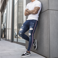 Jeans skinny pour homme à rayures latérales déchirées, pantalon en denim extensible de haute qualité avec rayures latérales rouges et blanches
