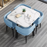 Ensemble de table à manger en pierre moderne, finition brillante, design gain de place, pieds en métal, 4 chaises en cuir artificiel pour la maison et l'hôtel