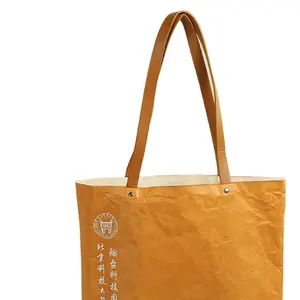 OEM/ODM impression personnalisée grand sac fourre-tout durable et étanche en papier Dupont avec logo