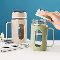Vente directe d'usine, tasse à eau chaude anti-fuite promotionnelle, tasse en verre de bureau, bouteilles d'eau en verre personnalisées avec logo, avec poignée