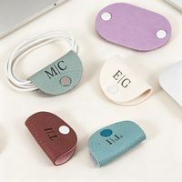 Organisateur de câbles en cuir PU avec logo personnalisé, bouton pression, attache en néoprène, support de câble pour cadeaux promotionnels